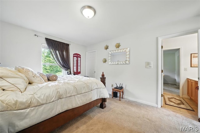 27 Carlton Lake Ct, Wentzville, MO 63385 - bedroom featuring light carpet and baseboards