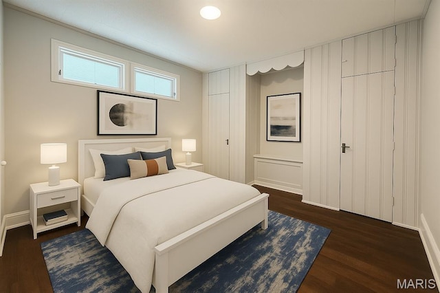 4707 Primm St, Saint Louis, MO 63116 - bedroom with dark wood-style flooring and baseboards