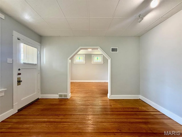 4707 Primm St, Saint Louis, MO 63116 - bonus room with arched walkways and wood finished floors