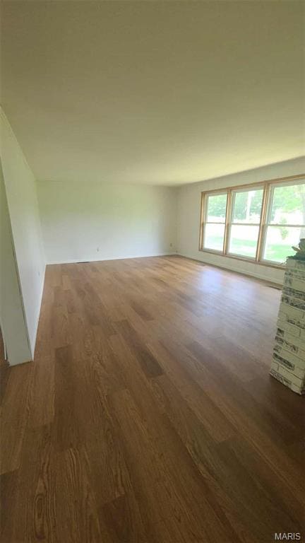 48 E N Ave, Ellsinore, MO 63937 - unfurnished room featuring wood finished floors