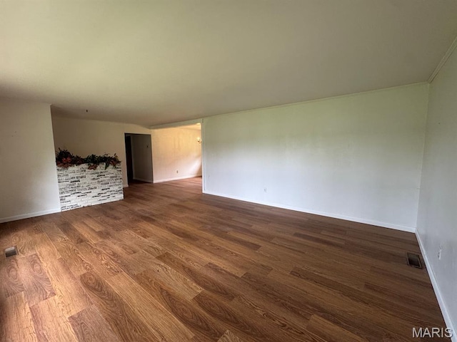 48 E N Ave, Ellsinore, MO 63937 - spare room featuring dark wood-style floors and baseboards