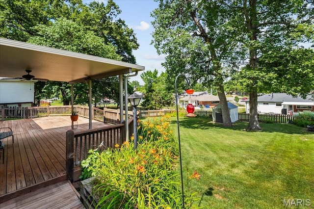 8822 Crest Oak Ln, Saint Louis, MO 63126 - view of yard featuring a wooden deck and a ceiling fan