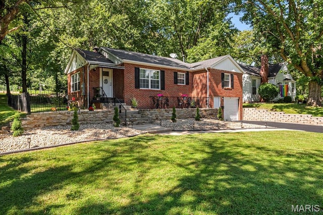407 N 28th St, Belleville, IL 62226 - single story home featuring brick siding, a garage, concrete driveway, and a front yard