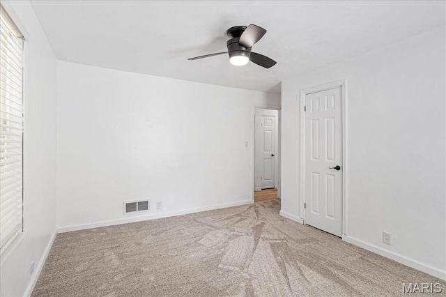 407 N 28th St, Belleville, IL 62226 - unfurnished bedroom featuring carpet floors and a ceiling fan