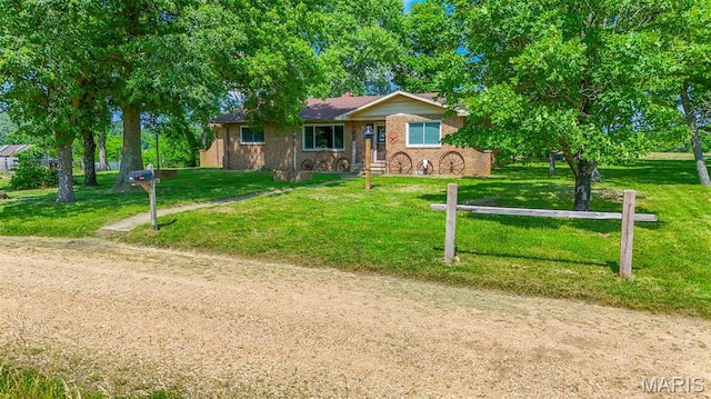 31337 Hudson Rd, Lebanon, MO 65536 - single story home featuring a front lawn and stone siding