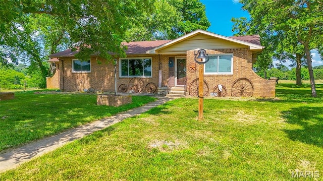 31337 Hudson Rd, Lebanon, MO 65536 - ranch-style home with a front yard and brick siding