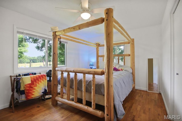 31337 Hudson Rd, Lebanon, MO 65536 - bedroom featuring wood finished floors and a ceiling fan