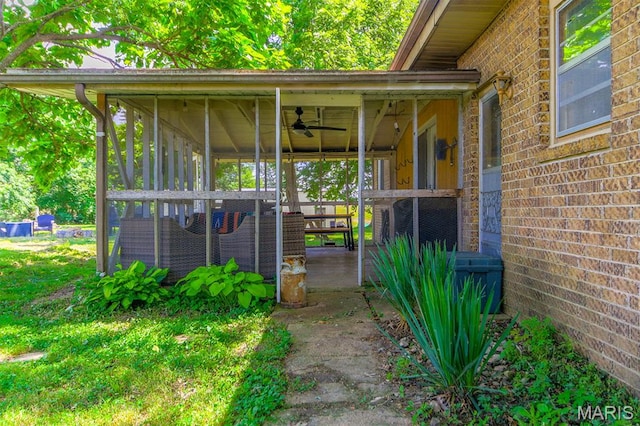 31337 Hudson Rd, Lebanon, MO 65536 - property entrance with brick siding and a ceiling fan
