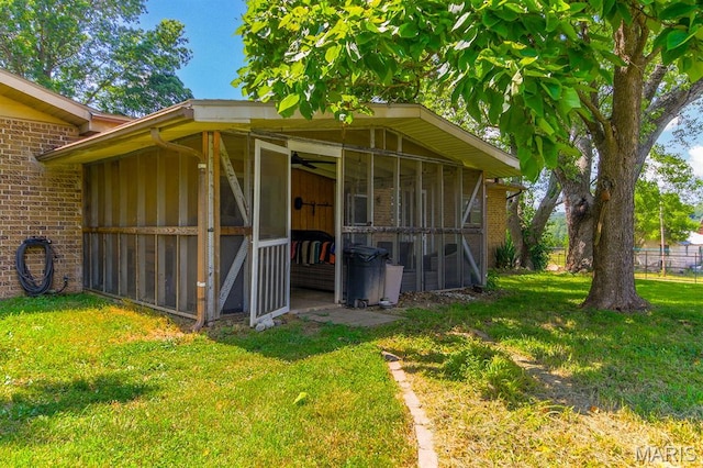 31337 Hudson Rd, Lebanon, MO 65536 - view of outbuilding featuring a sunroom
