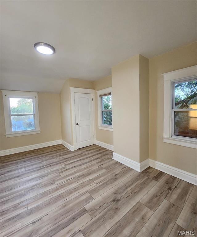 2020 S Brentwood Blvd, Saint Louis, MO 63144 - spare room with wood finished floors and healthy amount of natural light