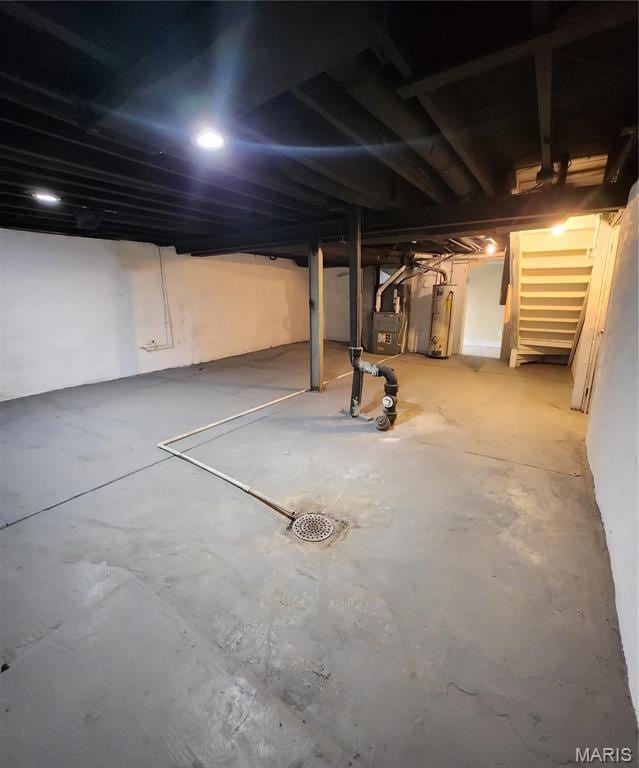 2020 S Brentwood Blvd, Saint Louis, MO 63144 - unfinished basement with water heater and heating unit