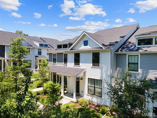 618 Maple Frst, Saint Louis, MO 63122 - townhome / multi-family property with a shingled roof and a residential view