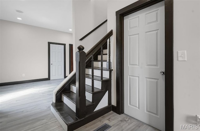 5123 Wicklow Pl, Saint Louis, MO 63111 - stairs featuring wood finished floors and recessed lighting
