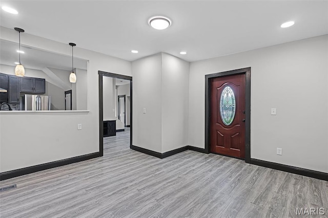 5123 Wicklow Pl, Saint Louis, MO 63111 - foyer entrance featuring wood finished floors and recessed lighting