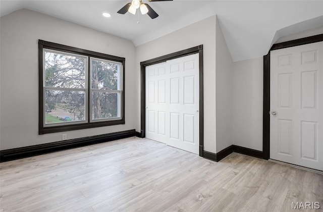 5123 Wicklow Pl, Saint Louis, MO 63111 - unfurnished bedroom featuring light wood-type flooring, a closet, ceiling fan, lofted ceiling, and recessed lighting