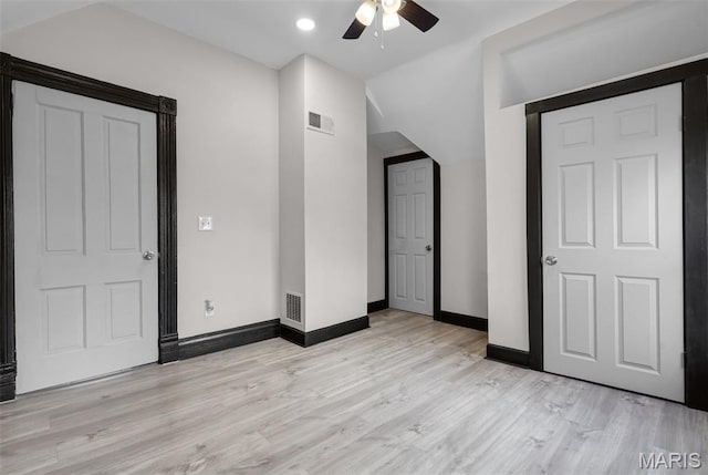 5123 Wicklow Pl, Saint Louis, MO 63111 - unfurnished bedroom featuring light wood finished floors, lofted ceiling, a ceiling fan, and recessed lighting