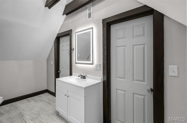 5123 Wicklow Pl, Saint Louis, MO 63111 - bathroom featuring vanity, marble finish flooring, and vaulted ceiling