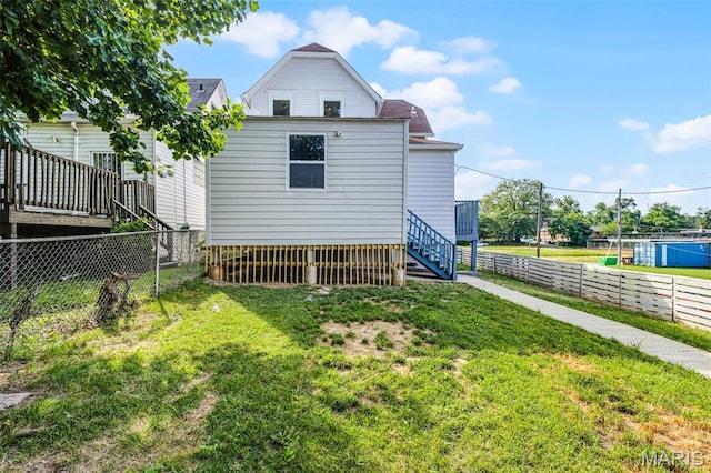 5123 Wicklow Pl, Saint Louis, MO 63111 - rear view of house with a fenced backyard and stairs