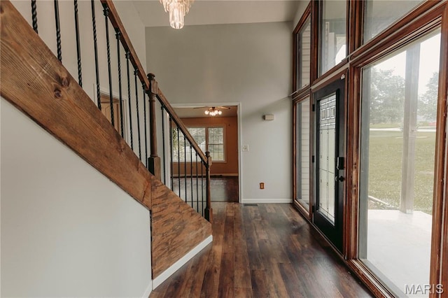 20055 Simmons Rd, Waynesville, MO 65583 - entrance foyer with wood finished floors, stairs, and a chandelier