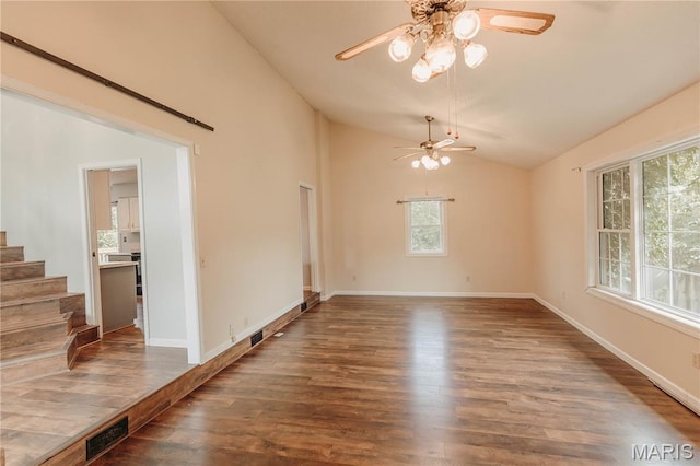 20055 Simmons Rd, Waynesville, MO 65583 - unfurnished room featuring lofted ceiling, a ceiling fan, wood finished floors, and stairway