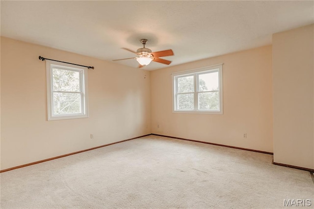20055 Simmons Rd, Waynesville, MO 65583 - carpeted empty room featuring healthy amount of natural light and ceiling fan