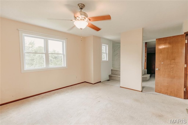 20055 Simmons Rd, Waynesville, MO 65583 - unfurnished bedroom featuring carpet flooring and ceiling fan