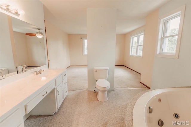 20055 Simmons Rd, Waynesville, MO 65583 - bathroom featuring vanity, a whirlpool tub, and ceiling fan