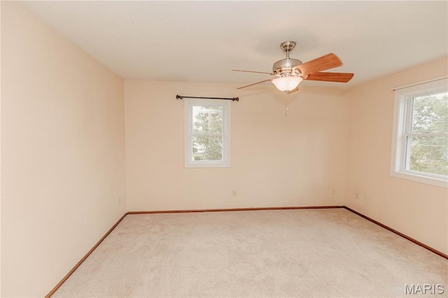20055 Simmons Rd, Waynesville, MO 65583 - carpeted empty room featuring baseboards and ceiling fan