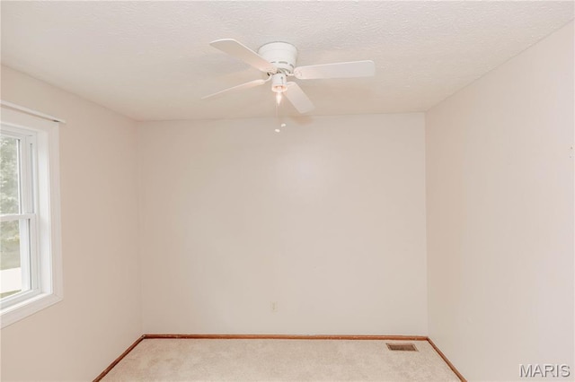 20055 Simmons Rd, Waynesville, MO 65583 - unfurnished room with light colored carpet and ceiling fan