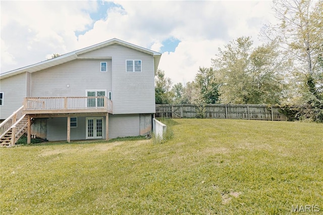 20055 Simmons Rd, Waynesville, MO 65583 - back of house with a wooden deck, french doors, and stairway
