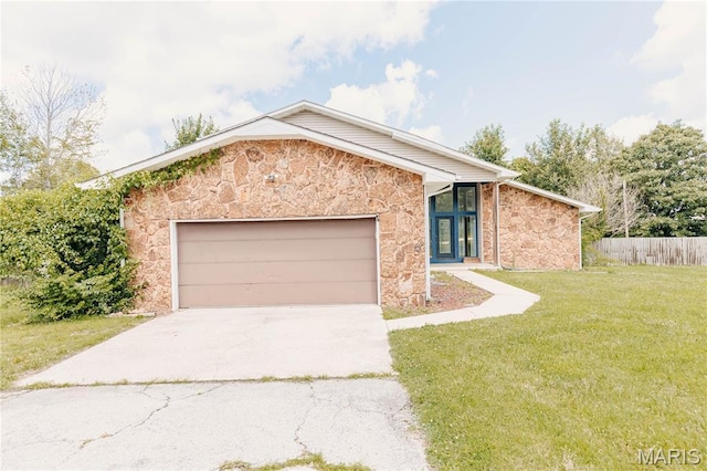 20055 Simmons Rd, Waynesville, MO 65583 - view of front of house featuring stone siding, an attached garage, and concrete driveway