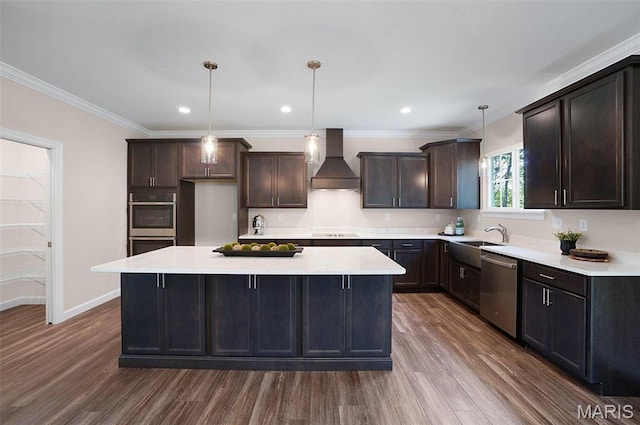 5 Schaper Farms Ct, Foristell, MO 63348 - kitchen with stainless steel appliances, wall chimney range hood, dark wood-style floors, a kitchen island, and recessed lighting