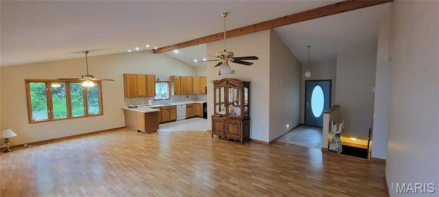 11112 Morrow Dr, Saint Ann, MO 63074 - kitchen featuring ceiling fan, light countertops, light wood-type flooring, beamed ceiling, and open floor plan
