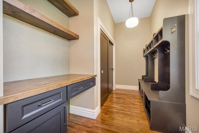 909 S 4th St, Saint Charles, MO 63301 - mudroom with wood finished floors and baseboards