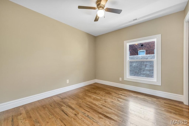 909 S 4th St, Saint Charles, MO 63301 - unfurnished room with light wood finished floors and ceiling fan