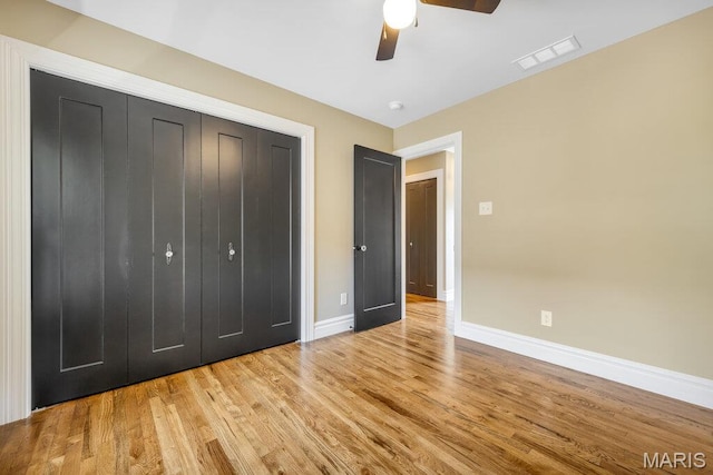 909 S 4th St, Saint Charles, MO 63301 - unfurnished bedroom featuring light wood-type flooring, ceiling fan, and a closet