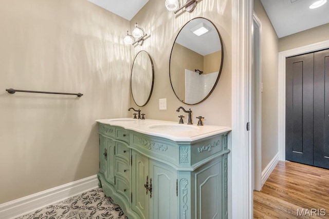 909 S 4th St, Saint Charles, MO 63301 - bathroom with baseboards and double vanity