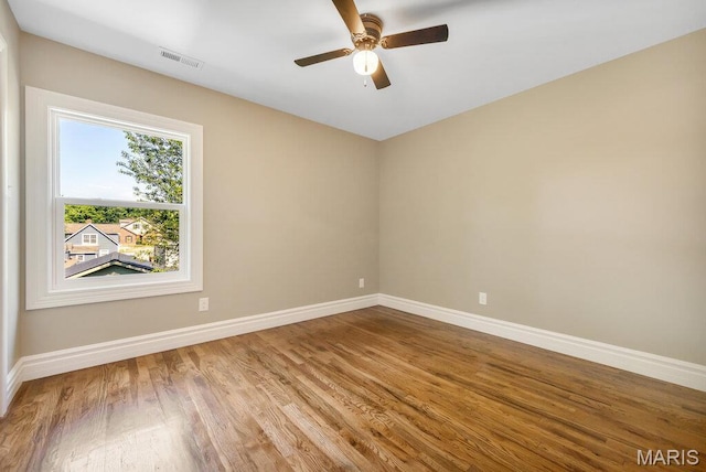 909 S 4th St, Saint Charles, MO 63301 - empty room featuring wood finished floors and ceiling fan