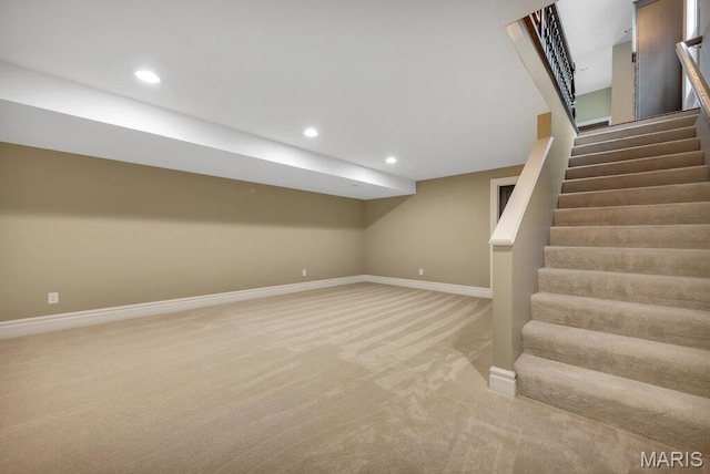 909 S 4th St, Saint Charles, MO 63301 - finished basement with light colored carpet, stairway, and recessed lighting