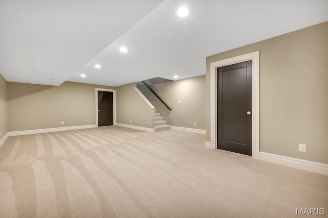 909 S 4th St, Saint Charles, MO 63301 - unfurnished living room featuring light carpet, recessed lighting, and stairs