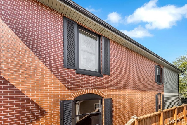 909 S 4th St, Saint Charles, MO 63301 - view of property exterior featuring brick siding