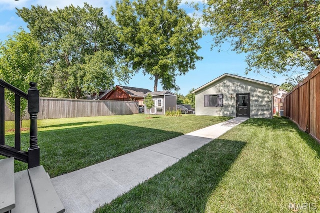 909 S 4th St, Saint Charles, MO 63301 - fenced backyard featuring an outbuilding