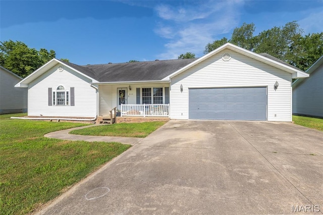 2635 Linda Ln, Poplar Bluff, MO 63901 - ranch-style home featuring covered porch, concrete driveway, an attached garage, and a front lawn