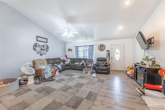 2635 Linda Ln, Poplar Bluff, MO 63901 - living area featuring light wood finished floors, a ceiling fan, vaulted ceiling, and recessed lighting