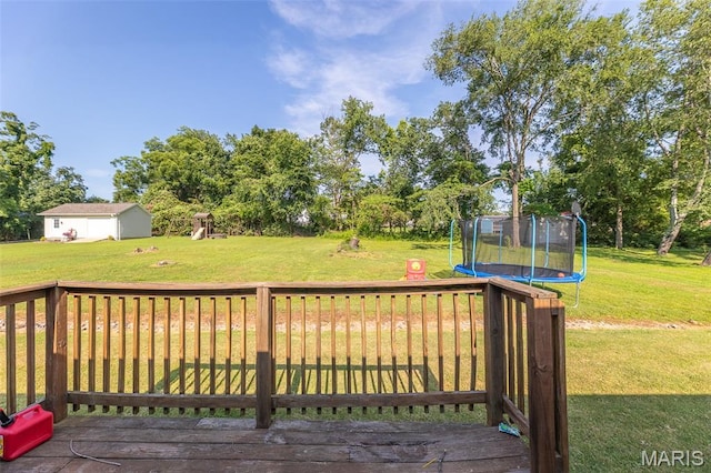 2635 Linda Ln, Poplar Bluff, MO 63901 - wooden deck featuring a trampoline and a lawn