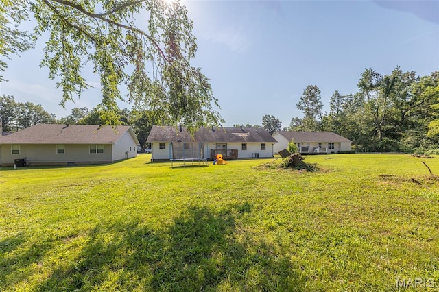 2635 Linda Ln, Poplar Bluff, MO 63901 - view of grassy yard with a trampoline