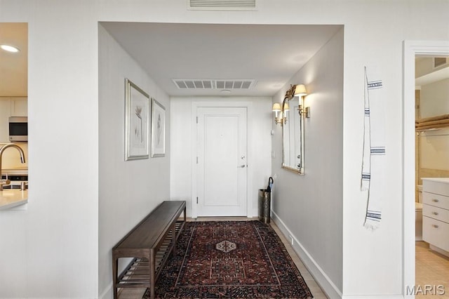 200 S Brentwood Blvd Unit 15C, Clayton, MO 63105 - corridor featuring baseboards and recessed lighting