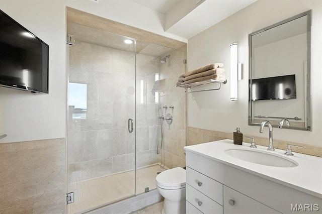 200 S Brentwood Blvd Unit 15C, Clayton, MO 63105 - full bath featuring vanity, a stall shower, and tile walls