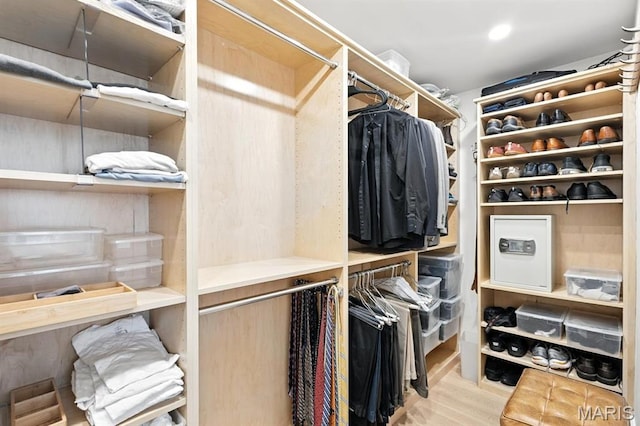 200 S Brentwood Blvd Unit 15C, Clayton, MO 63105 - walk in closet with wood finished floors