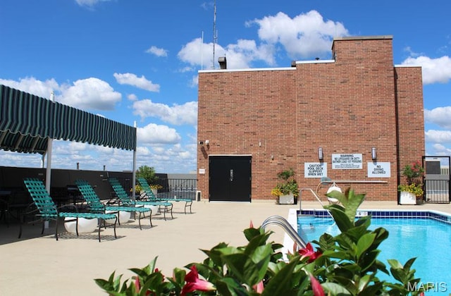 200 S Brentwood Blvd Unit 15C, Clayton, MO 63105 - community pool featuring a patio area